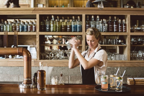 Bartender shakes drink