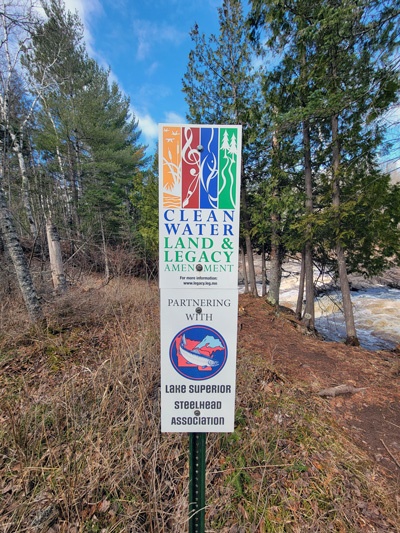 Legacy Amendment sign in forest by Knife River