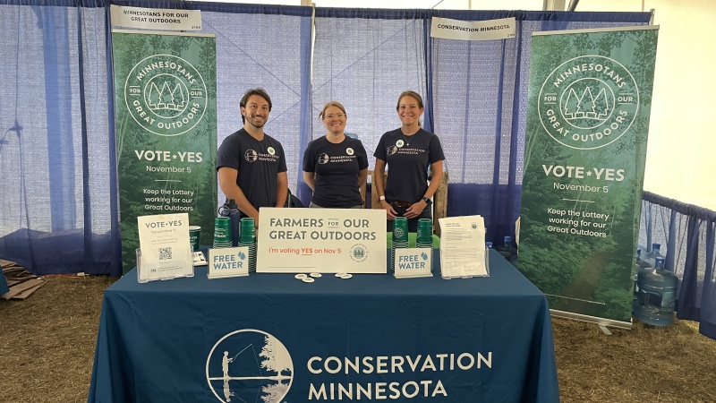 Conservation Minnesota staff at a Farmfest booth