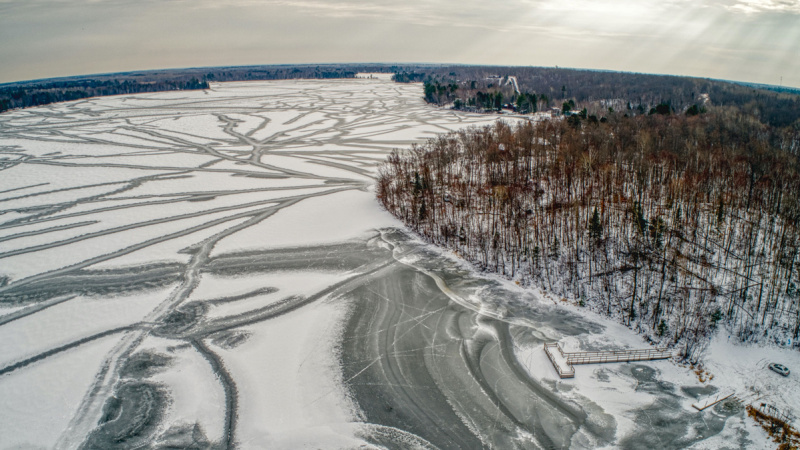 aerial view of frozen waters and woods at Fond du Lac reservation