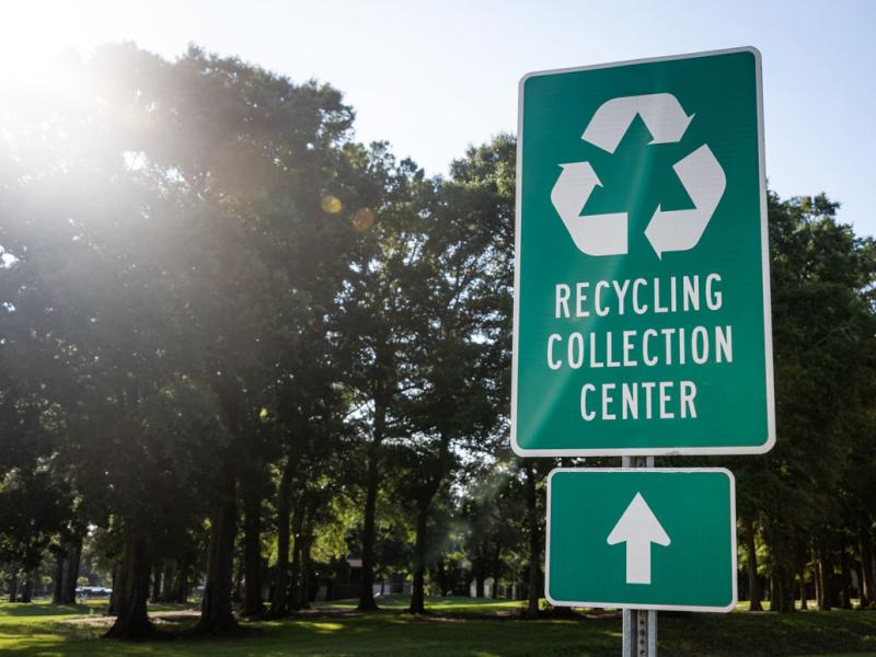 recycling collection center sign near park