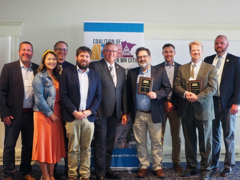 Group of people at the Coalition of Greater Minnesota Cities award ceremony