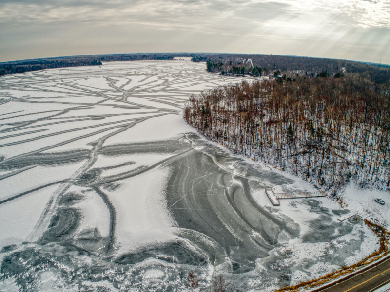 aerial view of frozen waters and woods at Fond du Lac reservation