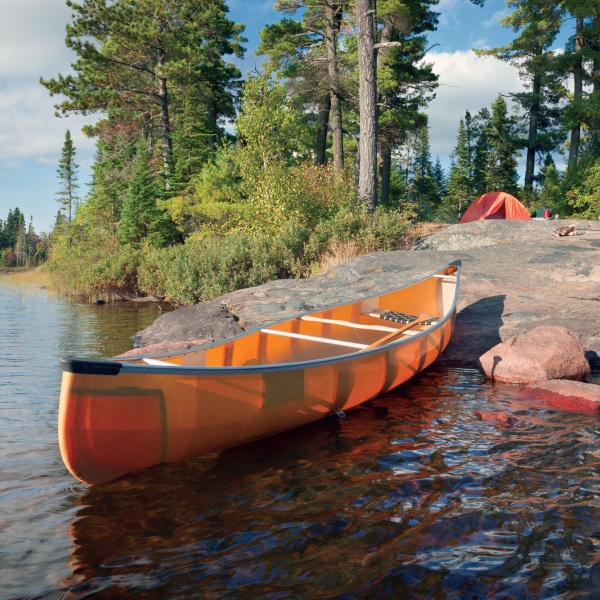 Canoe on the rocky shore of a campsite